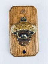 COCA-COLA Brass Wall Mount Bottle Opener Mounted On Oak Wood - Vintage - $12.00