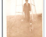 RPPC Man in Bowler Hat With Dog at Base of Windmill UNP Postcard P17 - $12.42