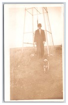 RPPC Man in Bowler Hat With Dog at Base of Windmill UNP Postcard P17 - £9.78 GBP