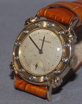 Gorgeous gents 50s era 14K gold wristwatch with crenelated DIAMOND BEZEL - $1,188.00
