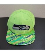 New Era Seattle Seahawks 9FIFTY Green Shiny Camo Snapback Trucker Hat - $36.00 CAD