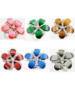 CZ FLOWERS IN BLOOM ADJUSTABLE STAINLESS STEEL RING - $3.19 CAD