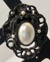 Vintage Black Filigree Brooch Pin With Oval Faux Pearl Cabochon 1 3/4&quot; - £7.82 GBP