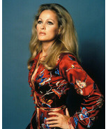Ursula Andress 1968 studio portrait in red Japanese style robe 12x18 Poster - $373.69 MXN