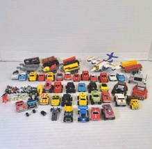 Lot of Vtg 50+ Toy Micro Machines Trucks Semi Trailers Cars Motorcycle Boat  - $121.51