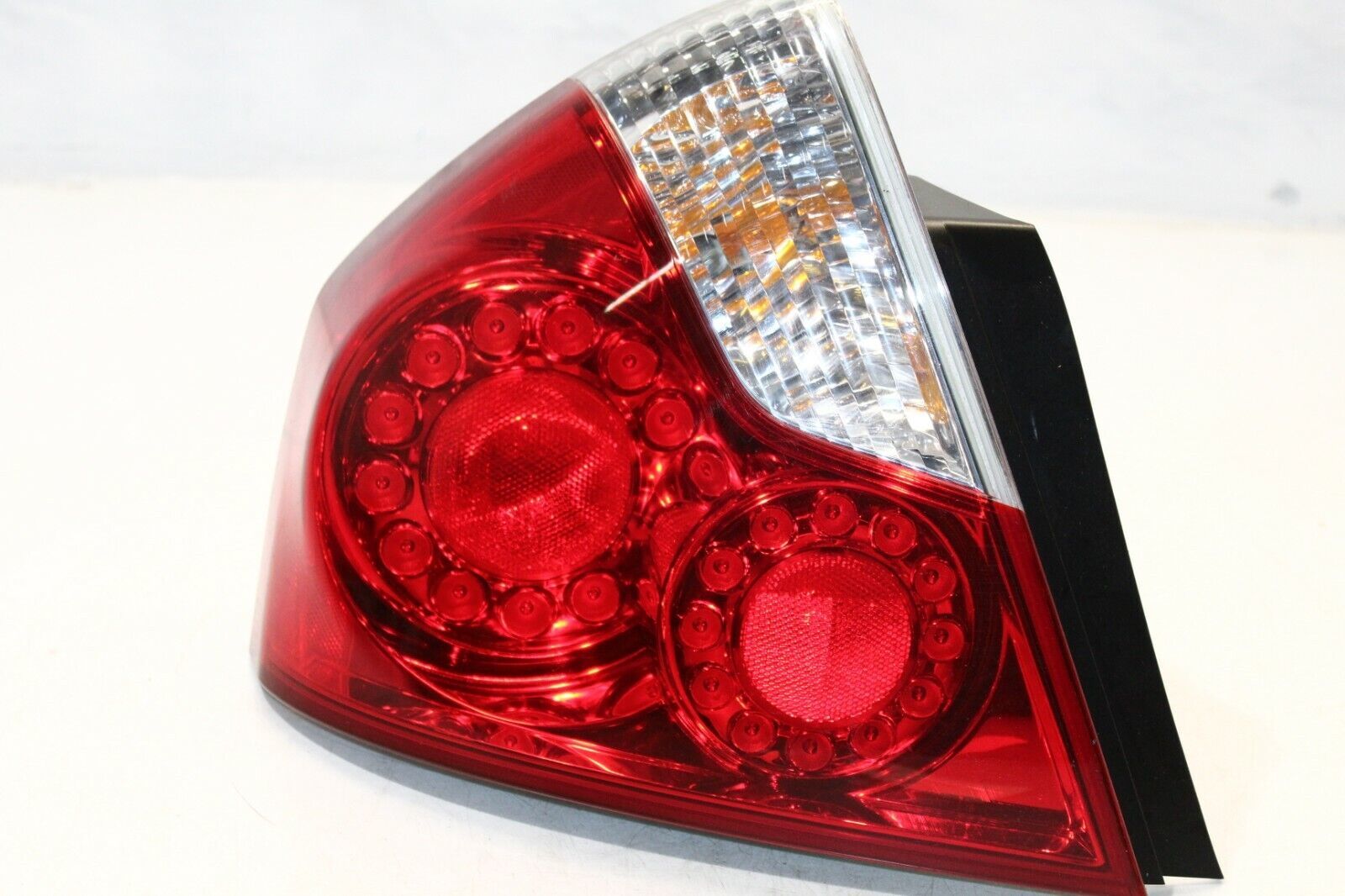 Primary image for 2006-2007 INFINITI M35 M45 REAR LEFT DRIVER TAIL LIGHT LENS ASSEMBLY P1891
