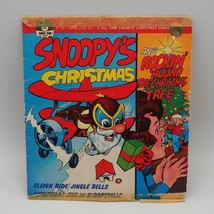 Vintage 45 RPM Peter Pan Snoopy&#39;s Christmas Rockin Round christmas Tree 7&quot; Vinyl - £30.08 GBP