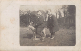 Young Boys Playing With Toy Hobby DONKEY~1908 Photo Postcard - £6.55 GBP