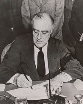 President Franklin D. Roosevelt signs Declaration of War on Japan Photo Print - $8.81+