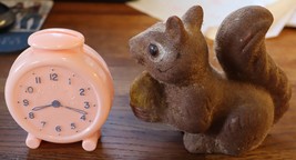2 vintage coin banks a squirrel and clock - $18.00