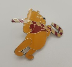 Disney Pin Winnie the Pooh Lifting Candy Cane Christmas Holiday Lapel Ve... - £15.64 GBP