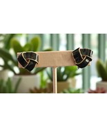 VINTAGE MONET BLACK AND GOLD LOVE KNOT CLIP EARRINGS - $147.69 MXN