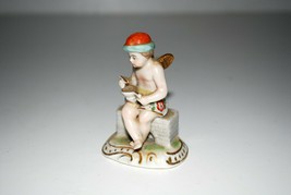 Adorable Antique Miniature Winged Figurine in the style of Chelsea Porcelain - £67.67 GBP