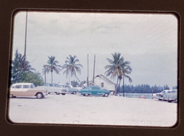 1950’s 2 Slide Color Photos Red Border Island Town Bait Shop Classic Cars Palms - £15.01 GBP