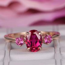 1.8ct Oval Cut Pink Ruby Engagement Ring Round Accent Trilogy 14k Rose Gold Over - £66.55 GBP