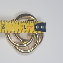 Vintage Monet Goldtone Brooch Lovers Knot Pin Circle Swirls Smooth - $4.99