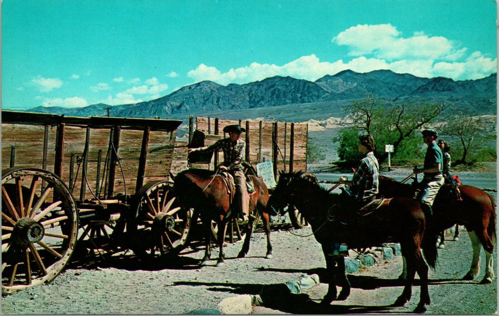 Primary image for Vtg  Postcard Furnace Creek Ranch California CA Riding Group Old Wagons UNP