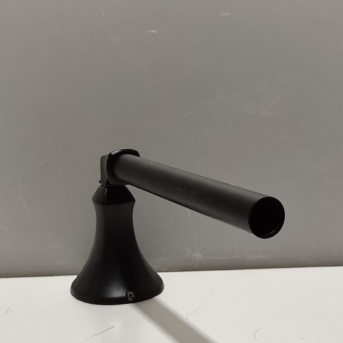 Delta Ashlyn Wall Mounted Pivoting Toilet Paper Holder Matte Black