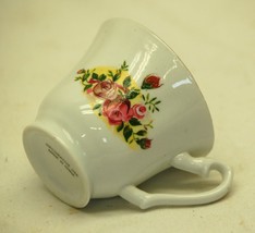 Porcelain Demitasse Tea Cup Gold Trim Floral Pattern - $9.89