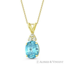 Oval Simulated Blue Topaz &amp; Round Cubic Zirconia Crystal 14k Yellow Gold Pendant - £62.06 GBP+