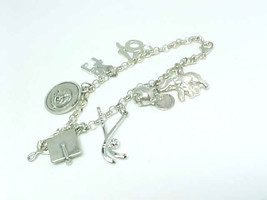Vintage Charm Bracelet In Sterling Silver With 8 Sterling Charms   7 1/4 Inches - £82.39 GBP