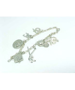 Vintage CHARM BRACELET in STERLING Silver with 8 STERLING CHARMS - 7 1/4... - £83.91 GBP