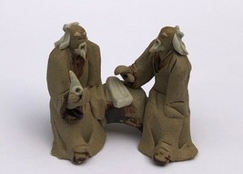 Ceramic Figurine Two Mud Men Sitting On A Bench Holding Pipe 2&quot; - £6.34 GBP