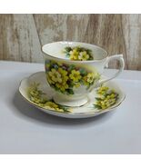 Royal Albert Tea Cup and Saucer Yellow Flowers Bone China England Vintage - $278.42 MXN