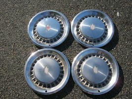 Genuine 1981 to 1987 Chevy Monte Carlo 14 inch hubcaps wheel covers - $55.75