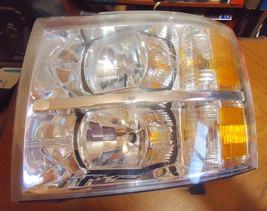 Fits 2007-2013 GMC Sierra  Silverado    Headlight Assembly    Left Side - $42.08