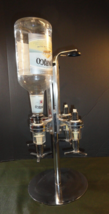 3 LIQUOR BOTTLE BUTLER CAROUSEL DISPENSER - $31.67