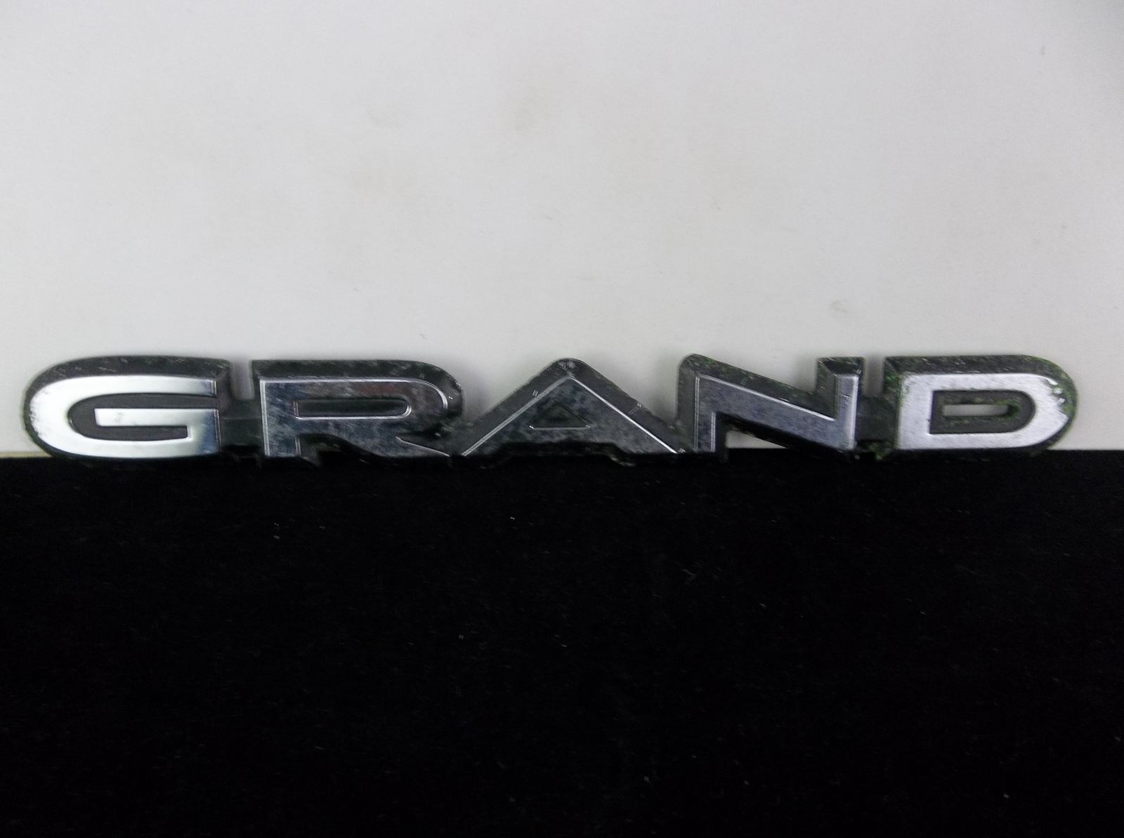 1980's Pontiac "Grand" Am Plastic Trunk Badge Emblem OEM - $10.00