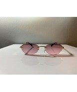 Unisex, rimless, oval shaped sunglasses with lavender lenses and gold frame - €8,61 EUR
