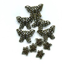 10 bronze tone mixed metal charms pendants lot filigrees butterflies jewelry - £2.19 GBP