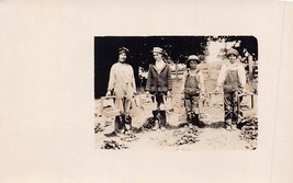 CHILDREN WITH WOOD BASKETS OF VEGETABLES? ~1914 REAL PHOTO POSTCARD - £6.04 GBP