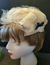 1950&#39;S CLIP ON HAT IVORY WITH BLACK BOWS ON SIDE - $14.00