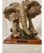 A. Belcari Sculpture of a Majestic Elephant, Featured on a Wood Stand - $76.39 CAD