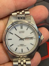Citizen Eco-drive Forma  E100-H26736 White Dial Operational Solar Powered - $95.04