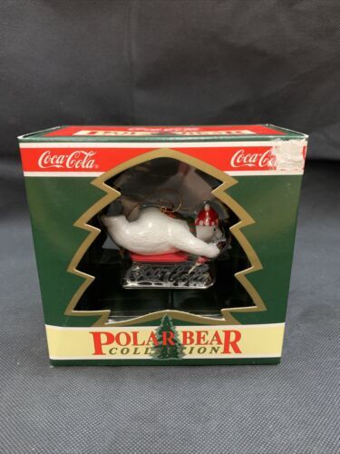 NEW Coca-Cola Bottle Polar Bear Christmas Ornament Winter Sledding Bear KG - $9.89