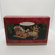 Hallmark Ornament Santa&#39;s Magical Sleigh 1997 NEW Artist Studio Reindeer Toys  - £12.05 GBP