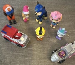 Lot Of Paw Patrol Figures And 2 Vehicles - $12.00