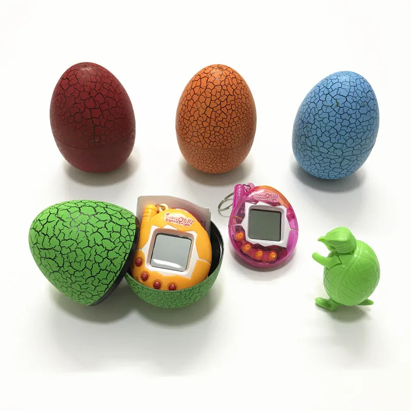 Dinosaur Eggshell Electronic Virtual Game Tumbler Egg Candy Package Box Toy - $10.68+
