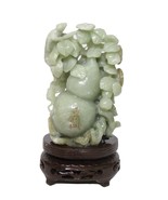 Chinese celadon jade gourd carved with flowers - £750.65 GBP