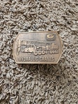 WA03142 *NOS* VINTAGE 1970s **GROVE HYDRAULIC CRANES** BELT BUCKLE - $24.24