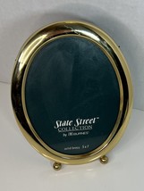 VTG Oval Picture Frame Solid Brass footed desk top 5”x7” - $14.03