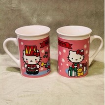 Vintage Hello Kitty Drummer Boy &amp; Opening Presents Pair of Christmas 12oz Mugs - £19.38 GBP