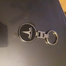 Tesla Keychain - $241.38 MXN
