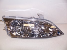 Fits 1997 - 2001 Lexus ES300 Rh Passenger Headlight Eagle Eyes 7231 C33R - $123.75