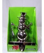 BE JOLLY CHROME FINISH SNOWMAN HOLDING TREE CHRISTMAS STOCKING HANGER - $543.14 MXN
