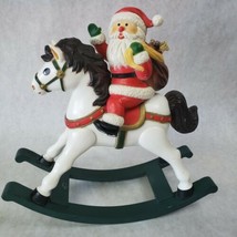 Vintage Santa Claus On Musical Rocking Horse Plastic Figurine - £8.30 GBP